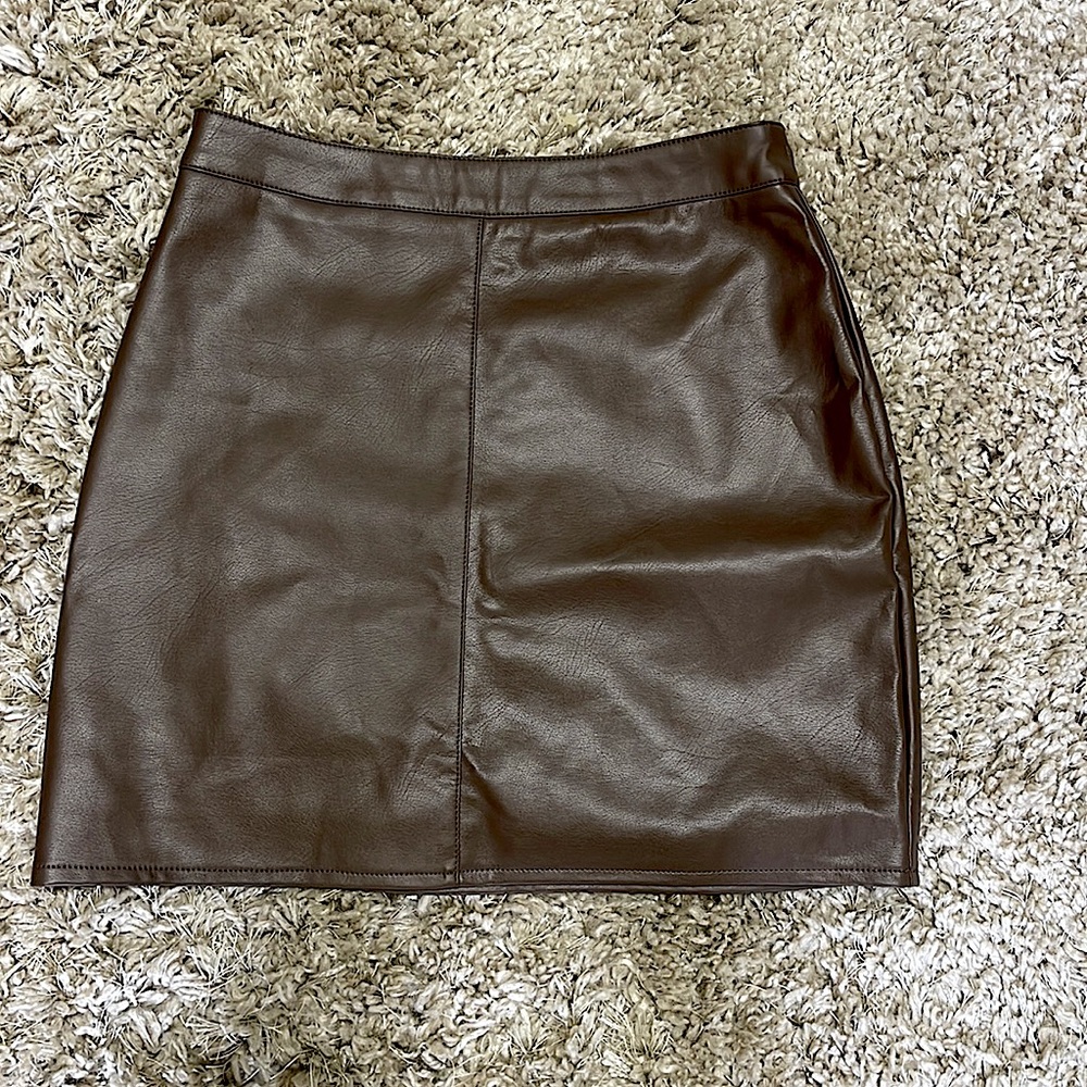 New brown leather mini skirt.
